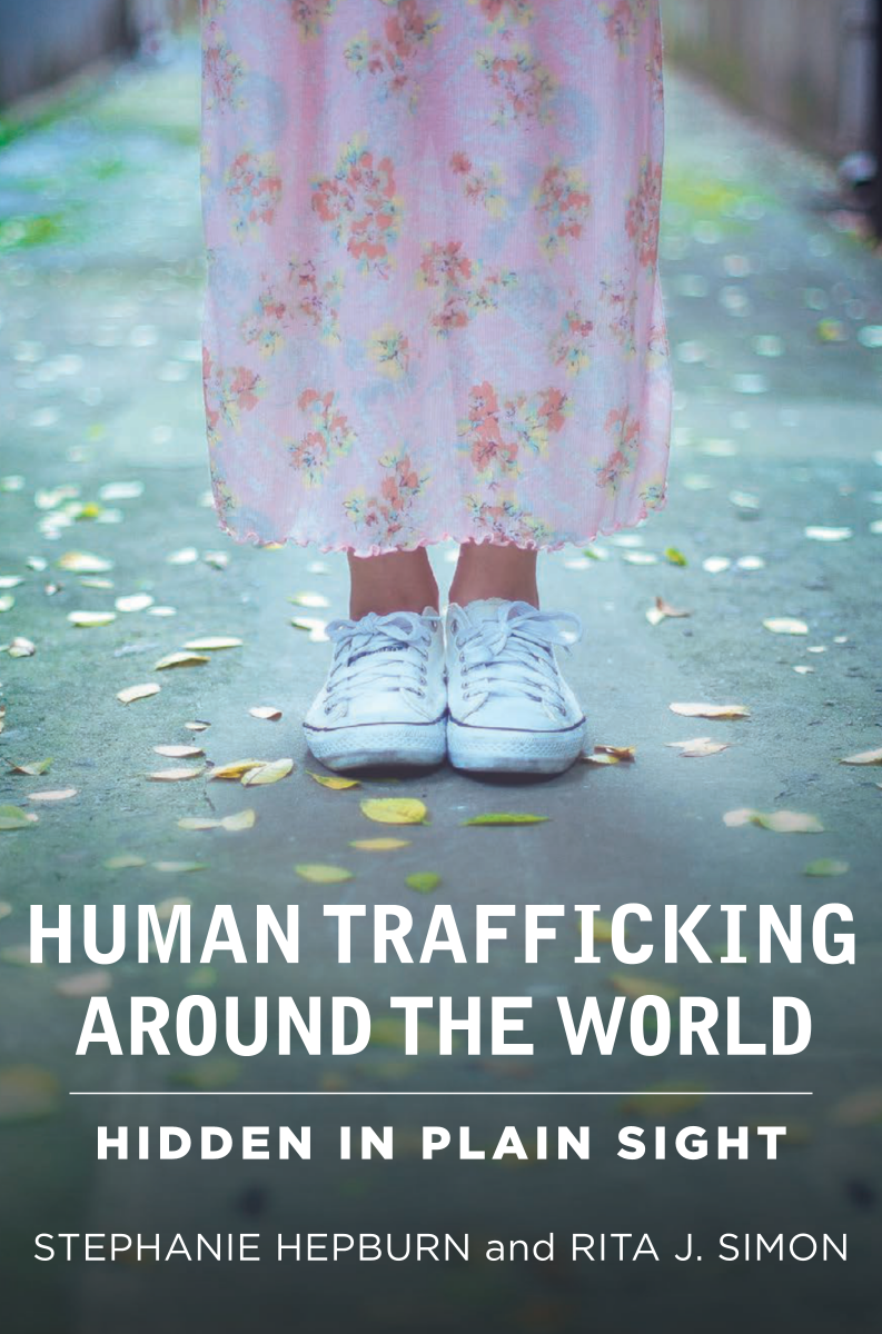 Human Trafficking Around the World: Hidden in Plain Sight page Front Cover1